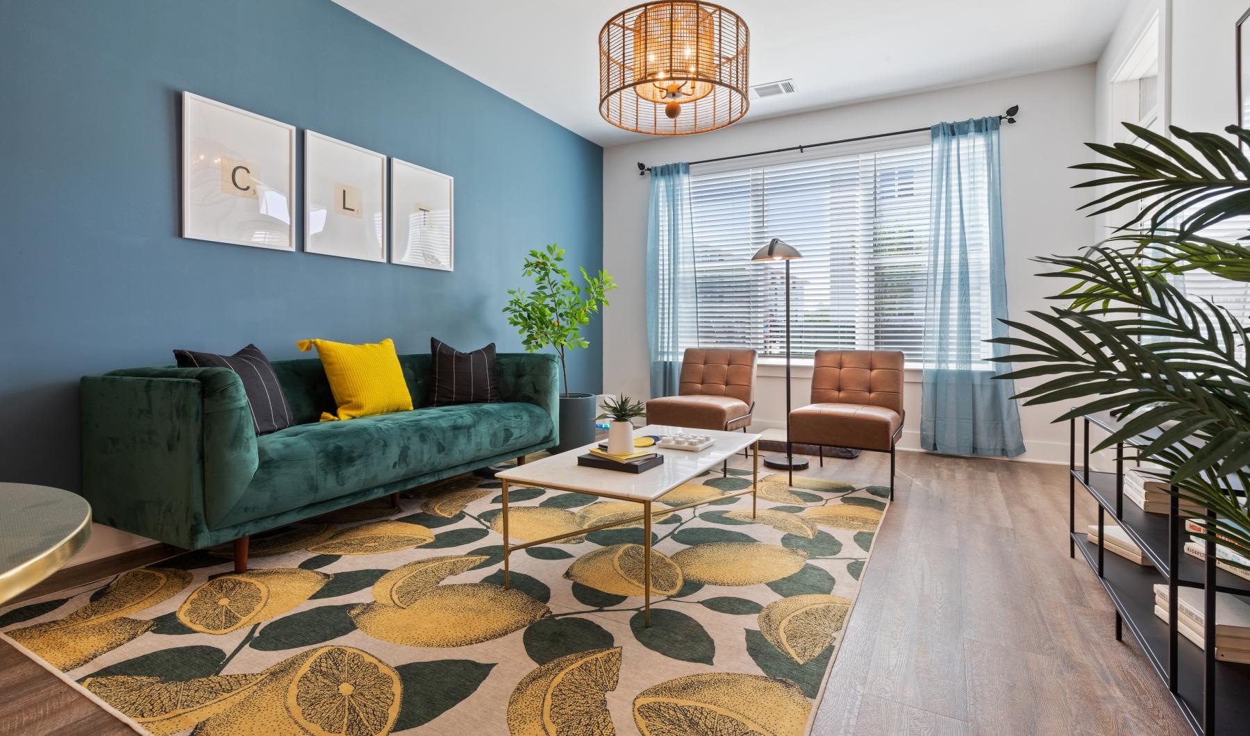 a living room with a rug and a couch