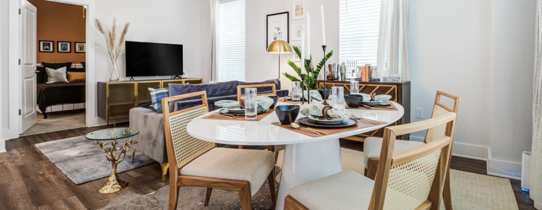 a dining room table with chairs